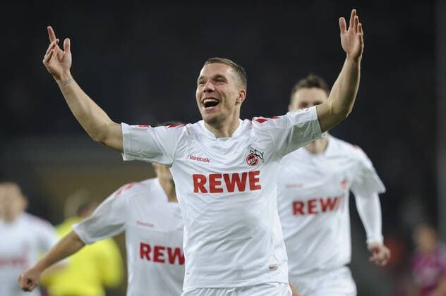 KÖLN, 28.01.2012, Lukas Podolski (1.FC Köln) jubelt nach seinem Treffer zum 1-0 im Fussball Bundesliga Spiel 1.FC Köln gegen FC Schalke 04 im Rhein Energie Stadion in Köln, 28.01.2012.