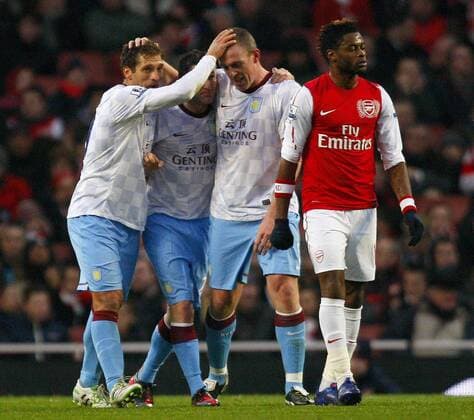 Richard Dunne of Aston Villa celebrates scoring his side s first goal Arsenal FC London vs Aston Villa in the FA Cup with Budweiser 4th Round, at the Emirates Stadium, London, 29th January 2012. EDITORIAL USE ONLY. No use with unauthorised audio, video, data, fixture lists, club league logos or live services. Online in-match use limited to 120 images, no video emulation. No use in betting, games or single club league player publications.