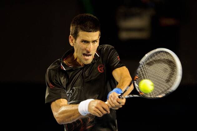 Melbourne, Victoria, Australia - Novak Djokovic (SRB) in action during the men s finals match on day 14 of the 2012 Australian Open at Melbourne Park, Australia. Tennis 2012 - Australian Open - Men s Final - ZUMAx35