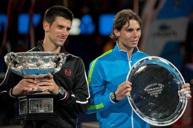 Melbourne, Victoria, Australia - Rafael Nadal (ESP, R) and Novak Djokovic (SRB) pose for pictures with their trophies at the men s finals match on day 14 of the 2012 Australian Open at Melbourne Park, Australia. Tennis 2012 - Australian Open - Men s Final - ZUMAx35