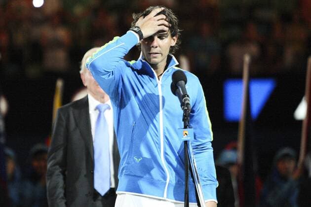 29 January 2012 : Rafael Nadal (ESP) in his final match against Novak Djokovic (SRB) with his hand on his head after losing the grandslam final during the presentation during Day 14 of the Mens final of the Australian Tennis open grand slam event at Melbourne Park, Melbourne Australia. TENNIS: JAN 29 Australian Open - Men s Final Icon12012931 EDITORIAL USE ONLY