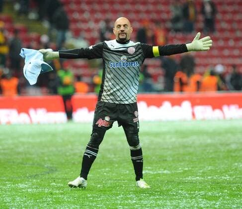 Turkey sportoto superleague football match between Galatasaray ( yellow - red) and Antalyaspor ( blue ) at Turk Telekom Arena stadium in Istanbul. 01.02.2012 Match Scored: Galatasaray 1- Antalyaspor 1 Pictured: Goalkeeper Omer Catkic of Antalyaspor. 