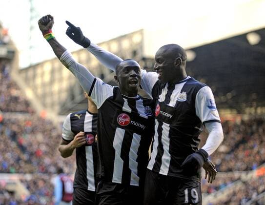 Papiss Demba Cisse (L) of Newcastle United celebrates scoring his side s second goal.Barclays Premier League match between Newcastle United v Aston Villa at the Sports Direct Arena at Newcastle upon Tyne on 5th February 2012. EDITORIAL USE ONLY. No use with unauthorised audio, video, data, fixture lists, club league logos or live services. Online in-match use limited to 120 images, no video emulation. No use in betting, games or single club league player publications.