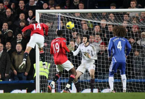 Manchester Uniteds Javier Hernandez Chicharito scoring his sides third goal.- Chelsea FC London vs. Manchester United in the the Barclays Premier League at the Stamford Bridge, London. 5th February 2012. EDITORIAL USE ONLY. No use with unauthorised audio, video, data, fixture lists, club league logos or live services. Online in-match use limited to 120 images, no video emulation. No use in betting, games or single club league player publications.