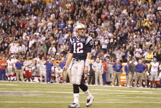February 5, 2012 - Indianapolis, Ind. - New England Patriots quarterback Tom Brady (12) walks off the field after a Patriots drive stalled and they had to settle for a first-half field goal in Super Bowl XLVI at Lucas Oil Stadium in Indianapolis. New England led 17-9 in the second half before losing 21-17 to the New York Giants. NFL American Football Herren USA 2012: Super Bowl XLVI FEB 5 - ZUMAcr2