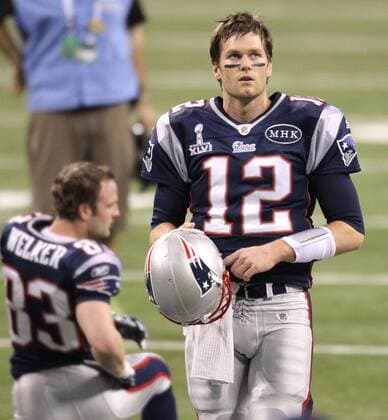 Feb. 5, 2012 - Indianapolis, IN, USA - New England Patriots quarterback Tom Brady warms up on the field before the start of Super Bowl XLVI at Lucas Oil Stadium in Indianapolis, Indiana, Sunday, February 5, 2012. Super Bowl XLVI - ZUMAm67