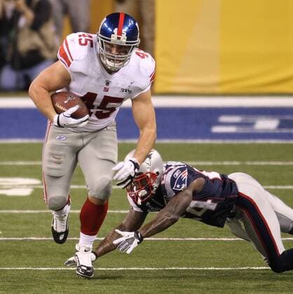 Feb. 5, 2012 - Indianapolis, IN, USA - Fullback Henry Hynoski (45) of the New York Giants gets away from strong safety James Ihedigbo (44) of the New England Patriots during first-quarter action of Superbowl XLVI on Sunday, February 5, 2012, at Lucas Oil Stadium in Indianapolis, Indiana. Super Bowl XLVI - ZUMAm67