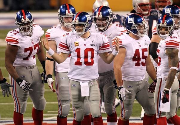 Feb. 5, 2012 - Indianapolis, IN, USA - Quarterback Eli Manning (10) of the New York Giants calls his teammates for a huddle during the first half of Superbowl XLVI on Sunday, February 5, 2012, at Lucas Oil Stadium in Indianapolis, Indiana. Super Bowl XLVI - ZUMAm67