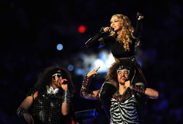 Madonna performs alongside LMFAO during the Halftime Show at Super Bowl XLVI between the New York Giants and the New England Patriots at Lucas Oil Stadium for NFL American Football Herren USA in Indianapolis, Indiana on February 5, 2012.  SBP20120205121