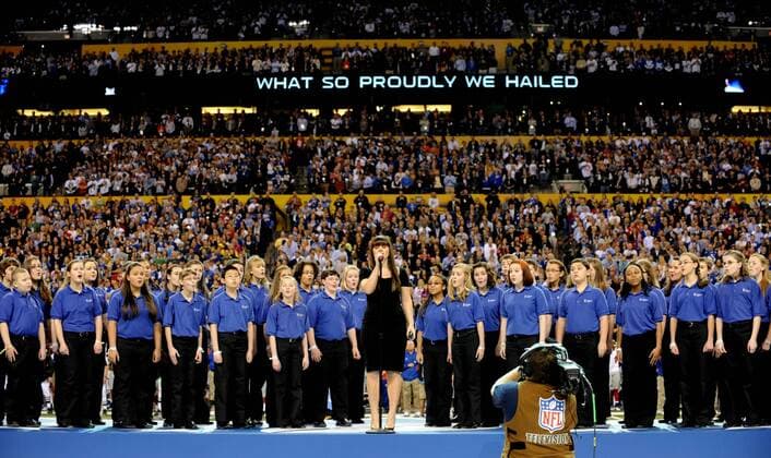Singer Kelly Clarkson performs the U.S. National Anthem prior to the start of Super Bowl XLVI between the New York Giants and the New England Patriots at Lucas Oil Stadium for NFL American Football Herren USA in Indianapolis, Indiana on February 5, 2012.  SBP20120205105