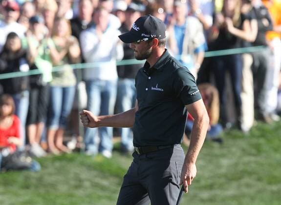 Feb. 5, 2012 - Phoenix, Arizona, U.S. - 5 February 2012: Kyle Stanley pumps his fist as Stanley makes the final putt on the 18th hole and wins the Waste Management Phoenix Open. - ZUMAx81