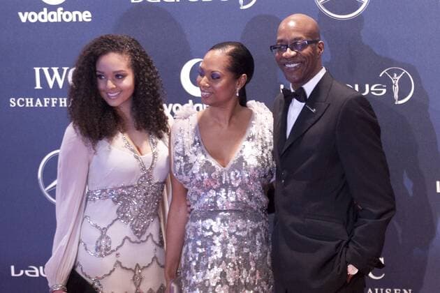 06.02.2012 London, England. Edwin Ed Moses and his family (wife Michelle) at the Laureus Sports Awards in The Queen Elizabeth Conference Centre London xMitchellxGunnx  ActionPlus11241933