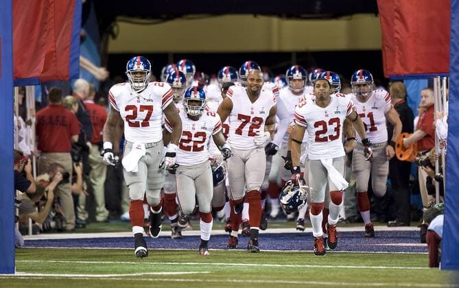 February 5, 2012: The Giants take the field before the start of the New York Giants game versus the New England Patriots in Super Bowl XLVI at Lucas Oil Stadium in Indianapolis, Indiana. The Giants defeated the Patriots, 21-17. ALL NEW YORK NEWSPAPERS OUT ---- ALL NEW YORK NEWSPAPERS OUT NFL American Football Herren USA FEB 05 Super Bowl XLVI - Giants v Patriots Icon94212020513 EDITORIAL USE ONLY