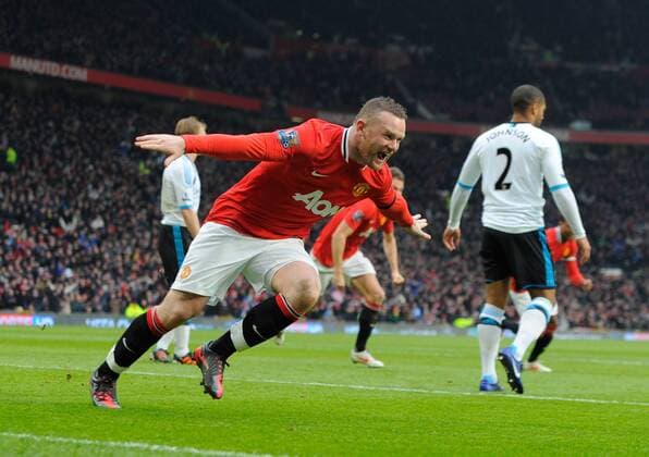 Wayne Rooney of Manchester United celebrates scoring his first goal.Barclays Premier League.Manchester United v Liverpool at Old Trafford, Manchester on the 11th February 2012 - EDITORIAL USE ONLY. No use with unauthorised audio, video, data, fixture lists, club league logos or live services. Online in-match use limited to 120 images, no video emulation. No use in betting, games or single club league player publications.