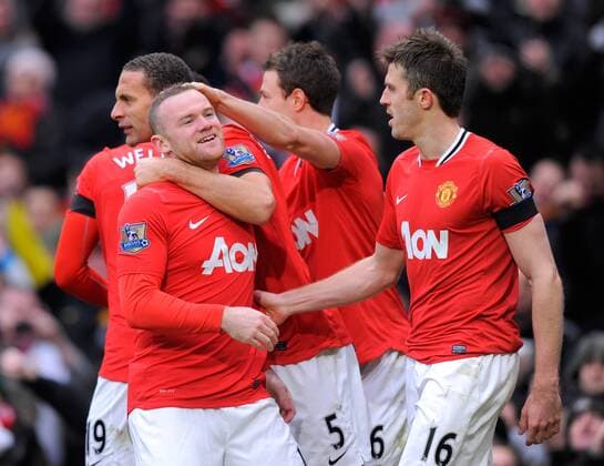 Wayne Rooney of Manchester United celebrates scoring.Barclays Premier League.Manchester United v Liverpool at Old Trafford, Manchester on the 11th February 2012 - EDITORIAL USE ONLY. No use with unauthorised audio, video, data, fixture lists, club league logos or live services. Online in-match use limited to 120 images, no video emulation. No use in betting, games or single club league player publications.