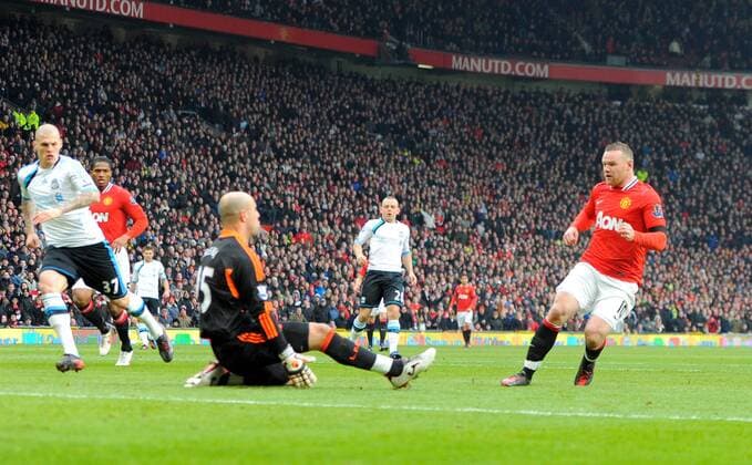 Wayne Rooney of Manchester United scores the second goal.Barclays Premier League.Manchester United v Liverpool at Old Trafford, Manchester on the 11th February 2012 - EDITORIAL USE ONLY. No use with unauthorised audio, video, data, fixture lists, club league logos or live services. Online in-match use limited to 120 images, no video emulation. No use in betting, games or single club league player publications.