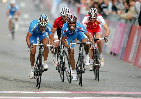 Radsport Radrennen Rad WM 2007 UCI Straßenrad Weltmeisterschaft Stuttgart 2007 Strassenrennen Elite Männer : v.l. Sieger Paolo Bettini (ITA) , 3. Platz Stefan Schumacher (GER) , 2. Platz Alexandr Kolobnev (RUS) , Frank Schleck (LUX)