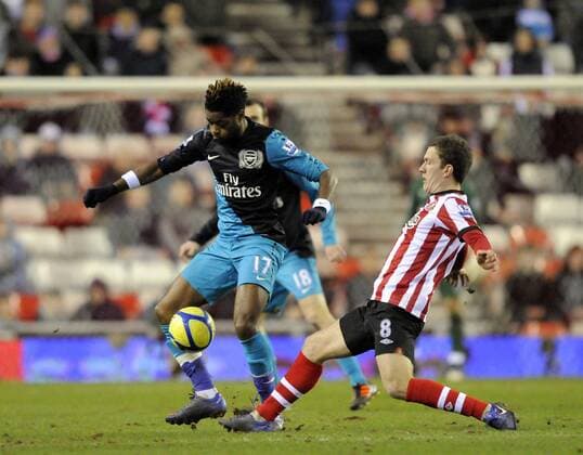 Craig Gardner of Sunderland (R) challenges Alexandre Song of Arsenal .The FA Cup with Budweiser 5th round match between Sunderland v Arsenal at the Stadium of Light at Sunderland on 18th February 2012.EDITORIAL USE ONLY. No use with unauthorised audio, video, data, fixture lists, club league logos or live services. Online in-match use limited to 120 images, no video emulation. No use in betting, games or single club league player publications.
