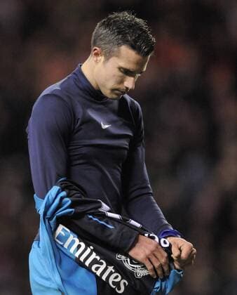 Robin van Persie of Arsenal looks dejected at the final whistle as they lose 2-0 to Sunderland.The FA Cup with Budweiser 5th round match between Sunderland AFC vs Arsenal FC London at the Stadium of Light at Sunderland on 18th February 2012..EDITORIAL USE ONLY. No use with unauthorised audio, video, data, fixture lists, club league logos or live services. Online in-match use limited to 120 images, no video emulation. No use in betting, games or single club league player publications.