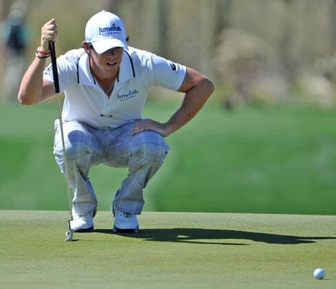 Rory McIlroy of Northern Ireland lines up his put on the seventh hole at the World Golf Championship Accenture Match Play Championship at the Ritz-Carlton Golf Club, Dove Mountain in Marana, Arizona, February 24, 2012. UPI Art Foxall  PXP2012022418
