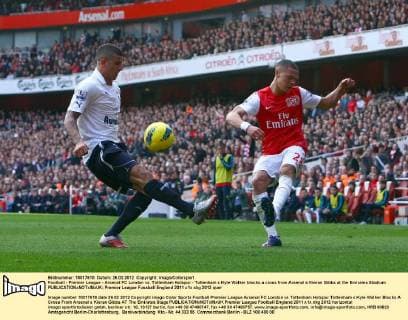 Football - Premier League - Arsenal FC London vs. Tottenham Hotspur - Tottenham s Kyle Walker blocks a cross from Arsenal s Kieran Gibbs at the Emirates Stadium