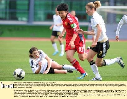 VILA REAL SANTO ANTONIO(PORTUGAL), March 2, 2012 - Ma Xiaoxu (C) of China drives the ball during the group A match against Germany at 2012 Algarve Women s Football Cup in Vila Real Santo Antonio, southern Portugal, March 2, 2012. China lost 0-1. 