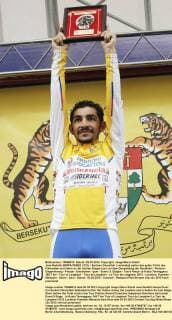 Jose Rodolfo SERPA PEREZ ( COL Androni Giocattoli ) verteidigt weiter das gelbe Trikot des Führenden und steht vor der letzten Etappe kurz vor dem Gesamtsieg der Rundfahrt - Podium - Siegerehrung - Freude - Emotionen - quer - Event: 9. Etappe - Tasik Kenyir to Kuala Terengganu 165.7 km - Tour of Langkawi - Tour de Langkawi - Le Tour de Langkawi 2012 - Location: Kuantan - Malaysia - Asien - Asia - Datum: 03.03.2012 - Contact