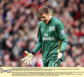 Arsenals Wojciech Szczesny celebrates his sides second goal..Liverpool FC V Arsenal FC, Barclays Premier League match at Anfield, Liverpool. 3rd March 2012. EDITORIAL USE ONLY. No use with unauthorised audio, video, data, fixture lists, club league logos or live services. Online in-match use limited to 120 images, no video emulation. No use in betting, games or single club league player publications.