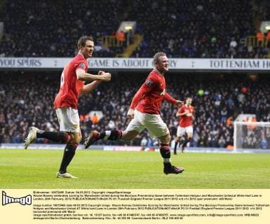Wayne Rooney celebrates scoring for Manchester United during the Barclays Premiership Game between Tottenham Hotspur and Manchester United,at White Hart Lane in London..26th February, 2012 EDITORIAL USE ONLY. No use with unauthorised audio, video, data, fixture lists, club league logos or live services. Online in-match use limited to 120 images, no video emulation. No use in betting, games or single club league player publications. PC 01