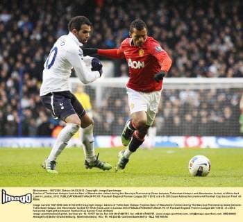 Sandro of Tottenham Hotspur tackles Nani of Manchester United during the Barclays Premiership Game between Tottenham Hotspur and Manchester United, at White Hart Lane in London, 2012. EDITORIAL USE ONLY. No use with unauthorised audio, video, data, fixture lists, club league logos or live services. Online in-match use limited to 120 images, no video emulation. No use in betting, games or single club league player publications. PC 01