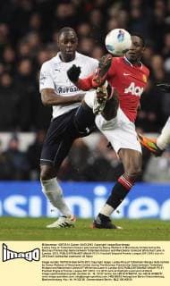 Ledley King of Tottenham Hotspur gets tackled by Danny Welbeck of Manchester United during the Barclays Premiership Game between Tottenham Hotspur and Manchester United,at White Hart Lane in London, 2012. EDITORIAL USE ONLY. No use with unauthorised audio, video, data, fixture lists, club league logos or live services. Online in-match use limited to 120 images, no video emulation. No use in betting, games or single club league player publications. PC 01
