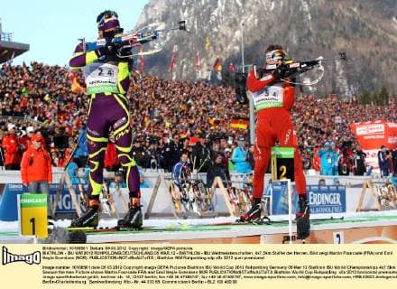 BIATHLON - IBU WM 2012 RUHPOLDING,DEUTSCHLAND,09.MAR.12 - BIATHLON - IBU Weltmeisterschaften, 4x7,5km Staffel der Herren. Bild zeigt Martin Fourcade (FRA) und Emil Hegle Svendsen (NOR). 