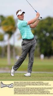 Mar 9, 2012; Luke Donald hits a tee shot on the 9th hole in the second round of the WGC Cadillac Championship at Doral Golf Resort & Spa in Doral, FL. PGA Golf Herren Tour: WGC-Caldillac Championship Mar 9 - ZUMAc04