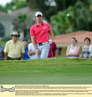 Mar 10, 2012; Rory Mcilroy chips out of green side bunker at the first hole in the third round of the WGC Cadillac Championship at Doral Golf Resort & Spa in Doral, FL. PGA Golf Herren Tour: WGC-Caldillac Championship Mar 10 - ZUMAc04