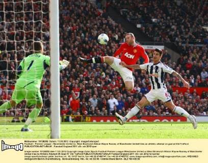 Football - Premier League - Manchester United vs. West Bromwich Albion Wayne Rooney of Manchester United tries an athletic attempt on goal at Old Trafford 