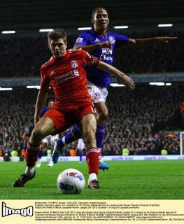 Football - Premier League - FC Liverpool vs. FC Everton Steven Gerrard of Liverpool and Steven Pienaar of Everton at Anfield 