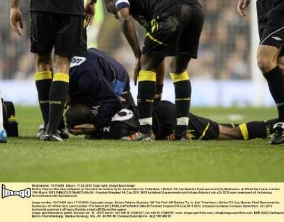 Bolton Fabrice Muamba collapses on the pitch as medics try to resuscitate him Tottenham v Bolton, FA Cup Quarter Final sponsored by Budweiser, at White Hart Lane, London. 17th March 2012 EDITORIAL USE ONLY. No use with unauthorised audio, video, data, fixture lists, club league logos or live services. Online in-match use limited to 120 images, no video emulation. No use in betting, games or single club league player publications.