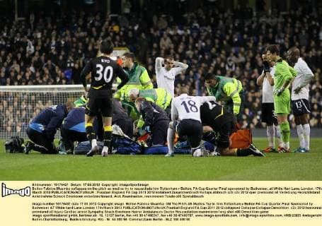 Bolton Fabrice Muamba collapses on the pitch as medics try to resuscitate him Tottenham v Bolton, FA Cup Quarter Final sponsored by Budweiser, at White Hart Lane, London. 17th March 2012 EDITORIAL USE ONLY. No use with unauthorised audio, video, data, fixture lists, club league logos or live services. Online in-match use limited to 120 images, no video emulation. No use in betting, games or single club league player publications.