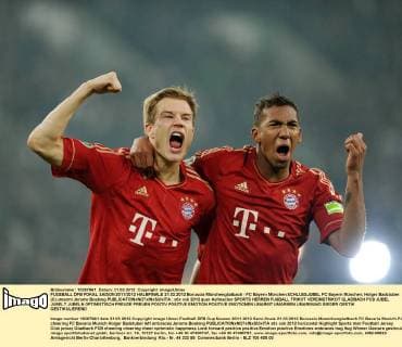 FUSSBALL DFB POKAL SAISON 2011 2012 HALBFINALE 21.03.2012 Borussia Mönchengladbach - FC Bayern München SCHLUSSJUBEL FC Bayern München; Holger Badstuber (li) umarmt Jerome Boateng 