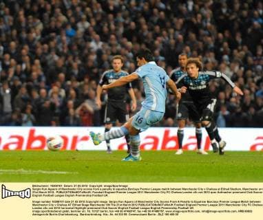 Sergio Kun Aguero of Manchester City scores from a penalty to equalise.Barclays Premier League match between Manchester City v Chelsea at Etihad Stadium, Manchester on the 21st March 2012.. EDITORIAL USE ONLY. No use with unauthorised audio, video, data, fixture lists, club league logos or live services. Online in-match use limited to 120 images, no video emulation. No use in betting, games or single club league player publications.