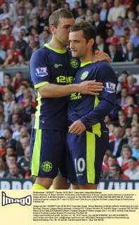 Shaun Maloney of Wigan Athletic celebrates scoring Barclays Premier League match between Liverpool FC v Wigan Athletic at Anfield Stadium, Liverpool on the 24th March 2012 EDITORIAL USE ONLY. No use with unauthorised audio, video, data, fixture lists, club league logos or live services. Online in-match use limited to 120 images, no video emulation. No use in betting, games or single club league player publications.