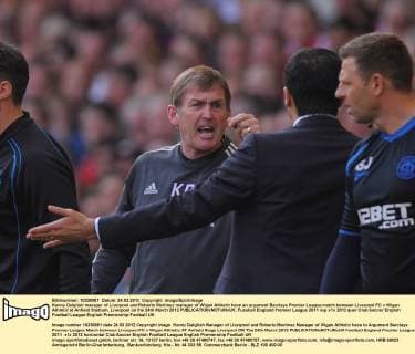 Kenny Dalglish manager of Liverpool and Roberto Martinez manager of Wigan Athletic have an argument Barclays Premier League match between Liverpool FC v Wigan Athletic at Anfield Stadium, Liverpool on the 24th March 2012 EDITORIAL USE ONLY. No use with unauthorised audio, video, data, fixture lists, club league logos or live services. Online in-match use limited to 120 images, no video emulation. No use in betting, games or single club league player publications.