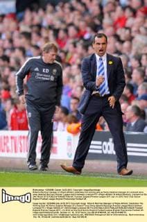 Roberto Martinez manager of Wigan Athletic celebrates the winning goal as Kenny Dalglish manager of Liverpool turns away dejected Barclays Premier League match between Liverpool FC v Wigan Athletic at Anfield Stadium, Liverpool on the 24th March 2012 EDITORIAL USE ONLY. No use with unauthorised audio, video, data, fixture lists, club league logos or live services. Online in-match use limited to 120 images, no video emulation. No use in betting, games or single club league player publications.