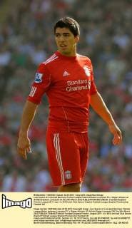 Luis Suarez of Liverpool Barclays Premier League match between Liverpool FC v Wigan Athletic at Anfield Stadium, Liverpool on the 24th March 2012 EDITORIAL USE ONLY. No use with unauthorised audio, video, data, fixture lists, club league logos or live services. Online in-match use limited to 120 images, no video emulation. No use in betting, games or single club league player publications.