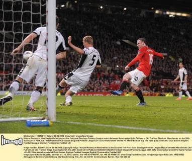 Wayne Rooney of Manchester United scores the first goal.Barclays Premier League match between Manchester Utd v Fulham at Old Trafford Stadium, Manchester on the 26th March 2012. EDITORIAL USE ONLY. No use with unauthorised audio, video, data, fixture lists, club league logos or live services. Online in-match use limited to 120 images, no video emulation. No use in betting, games or single club league player publications.