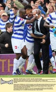 QPRs Samba Diakite celebrates scoring his sides second goal with Mark Hughes..Queens Park Rangers vs. Arsenal FC London, Barclays Premier League, at Loftus Road, London. 31st March 2012. EDITORIAL USE ONLY. No use with unauthorised audio, video, data, fixture lists, club league logos or live services. Online in-match use limited to 120 images, no video emulation. No use in betting, games or single club league player publications.