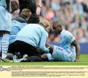 Micah Richards of Manchester City has an injury treated Barclays Premier League match between Manchester City v AFC Sunderland at the Etihad Stadium, Manchester on the 31st March 2012 EDITORIAL USE ONLY. No use with unauthorised audio, video, data, fixture lists, club league logos or live services. Online in-match use limited to 120 images, no video emulation. No use in betting, games or single club league player publications.