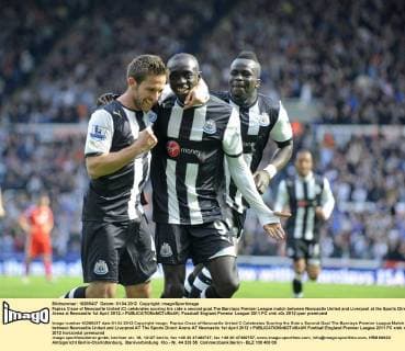 Papiss Cisse of Newcastle United (C) celebrates scoring his side s second goal.The Barclays Premier League match between Newcastle United and Liverpool at the Sports Direct Arena at Newcastle 1st April 2012..r EDITORIAL USE ONLY. No use with unauthorised audio, video, data, fixture lists, club league logos or live services. Online in-match use limited to 120 images, no video emulation. No use in betting, games or single club league player publications.