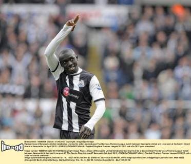 Papiss Cisse of Newcastle United celebrates scoring his side s second goal.The Barclays Premier League match between Newcastle United and Liverpool at the Sports Direct Arena at Newcastle 1st April 2012..r EDITORIAL USE ONLY. No use with unauthorised audio, video, data, fixture lists, club league logos or live services. Online in-match use limited to 120 images, no video emulation. No use in betting, games or single club league player publications.