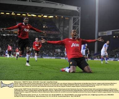 Ashley Young of Manchester United celebrates scoring the second goal with Luis Antonio Valencia of Manchester United.Barclays Premier League match between Blackburn Rovers v Manchester Utd at Ewood Park Stadium, Blackburn on the 2nd April 2012..EDITORIAL USE ONLY. No use with unauthorised audio, video, data, fixture lists, club league logos or live services. Online in-match use limited to 120 images, no video emulation. No use in betting, games or single club league player publications.